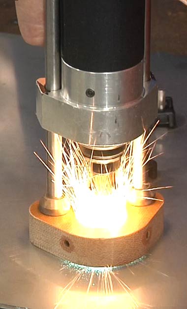 Stud Welding Gun firing a Weld Stud in to metal